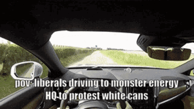 a car is driving down a road with a caption that says " liberals driving to monster energy "