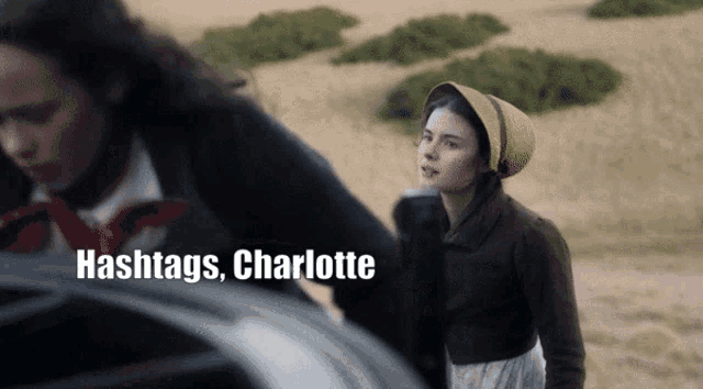 a woman in a straw hat is standing next to another woman with the words hashtags charlotte written on the bottom