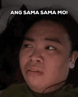a man with his eyes closed has ang sama sama mo written on his face .