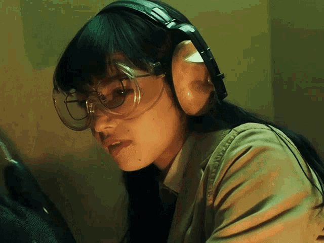 a woman wearing a pair of fake ears and glasses