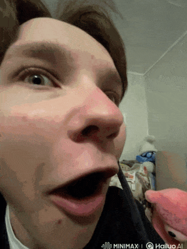 a close up of a person 's face with the words minimaxel hailuo ai visible