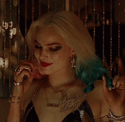 Harley Quinn Smiling GIF - Harley Quinn Smiling Playing With Hair GIFs