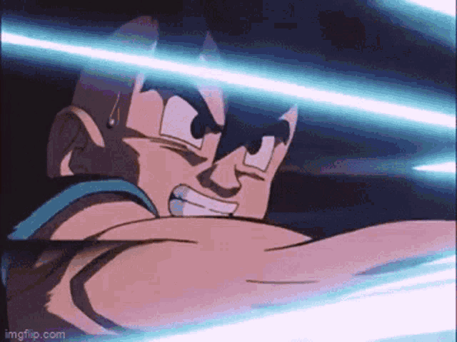 a close up of a cartoon character with a blue light coming out of his eyes .