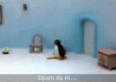 a penguin is sitting in a room with the words upam da ni