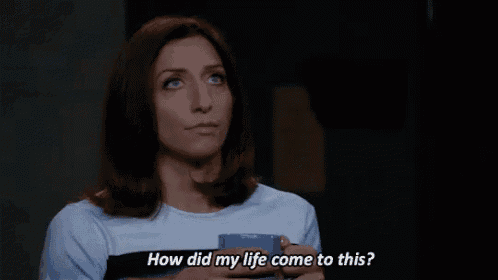 a woman is holding a blue cup of coffee and asking how did my life come to this .