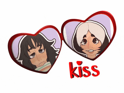 a couple of heart shaped mirrors with the word kiss below them