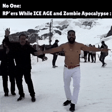 a man without a shirt is standing in the snow with his arms outstretched in front of a group of people