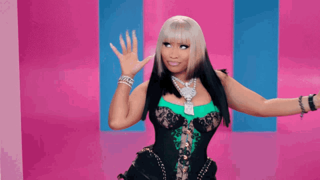 a woman in a corset is dancing in front of a pink and blue background .