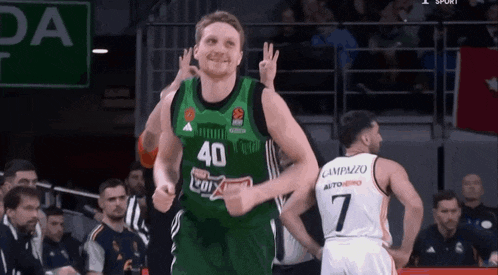 a basketball player wearing a green jersey with the number 40