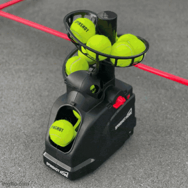 a tennis ball machine that says spinshot home