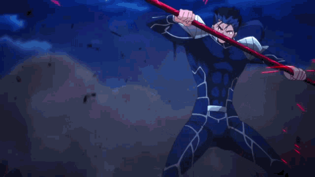 a person is holding a red shield in their hand