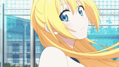 a girl with long blonde hair and blue eyes