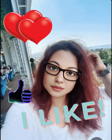 a woman wearing glasses and a white shirt with the word i like on it