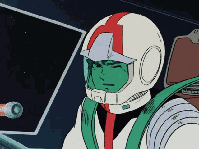 a man with a green face is wearing a white helmet