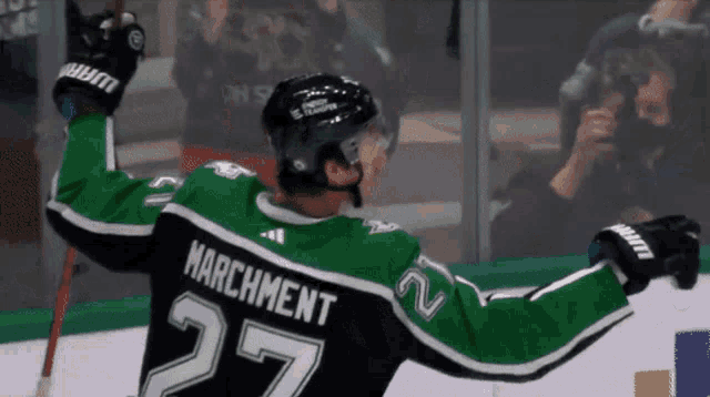 a hockey player with the name marchment on the back of his shirt