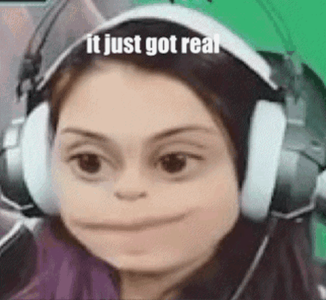 a woman wearing headphones is making a funny face while making a funny face .