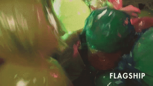 a bunch of balloons are floating in the air and the word flagship is on the bottom of the image