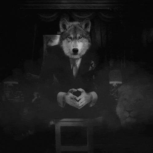 a black and white photo of a wolf wearing a suit