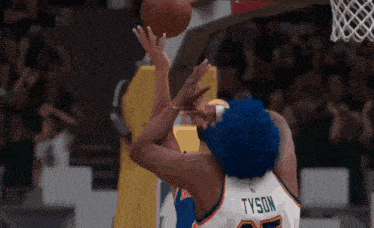 a basketball player with the name tyson on the back