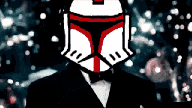 a man in a tuxedo with a clone trooper helmet on his head