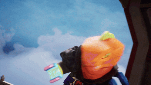 a cartoon character with a large orange pumpkin head