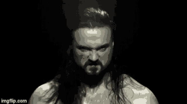 a pixelated image of a man with long hair and a beard with imgflip.com at the bottom of the image