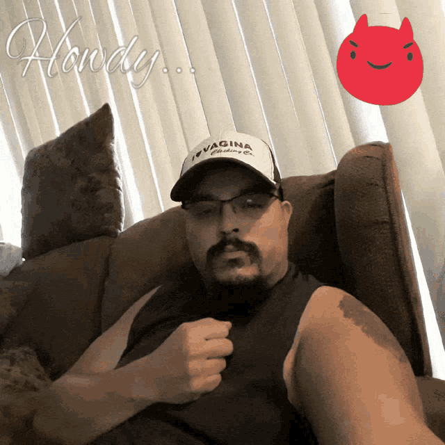 a man wearing a hat that says vagina