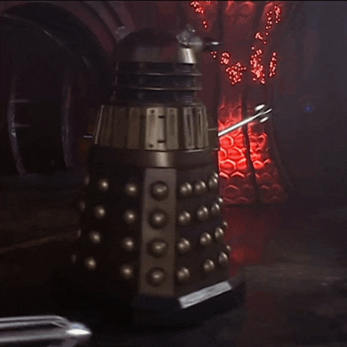a robot with a red light behind it that says ' ii ' on it