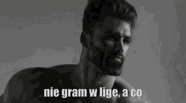 a black and white photo of a shirtless man with the words `` nie gram w lige , a co '' written on it .