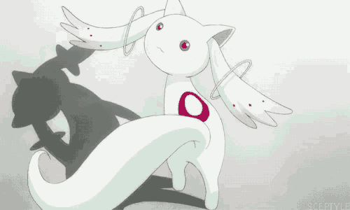 a close up of a white cartoon character with a red circle on her chest
