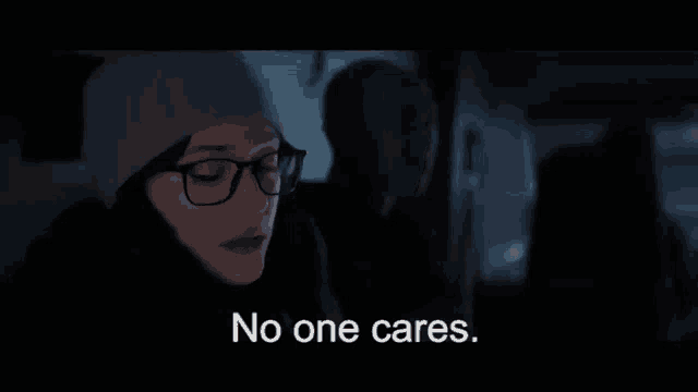 a woman wearing glasses says no one cares