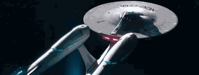 a space ship with the letters ncc-1701 on the top