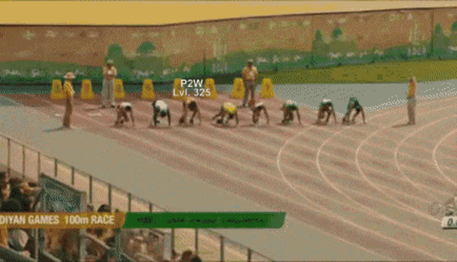 a group of athletes are getting ready to run on a track and the number 325 is displayed