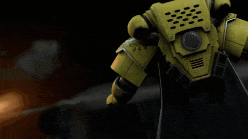 a green robot with a black cape is standing in the sand