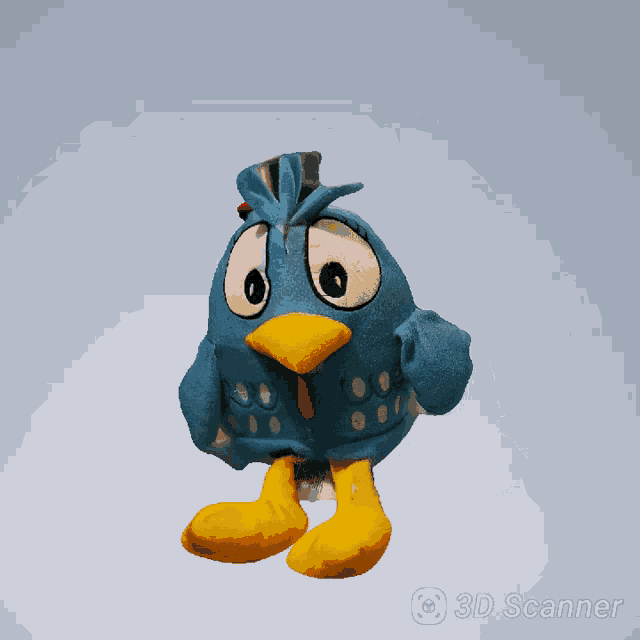 a 3d scanner shows a stuffed chicken with a red hat