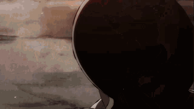 a close up of a person 's face with a shadow on it