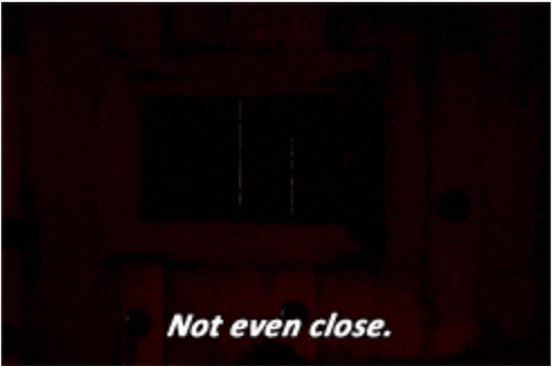 a picture of santa claus behind bars with the words not even close below him