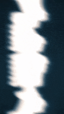 a blurred image of a person 's shadow on a dark blue background