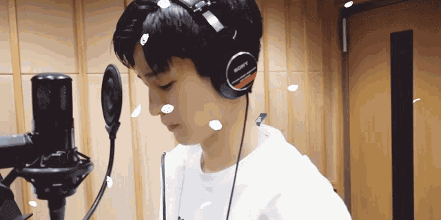 a person wearing headphones that say sony on them