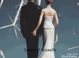 a bride and groom figurine with the words jordan y gianella on the bottom