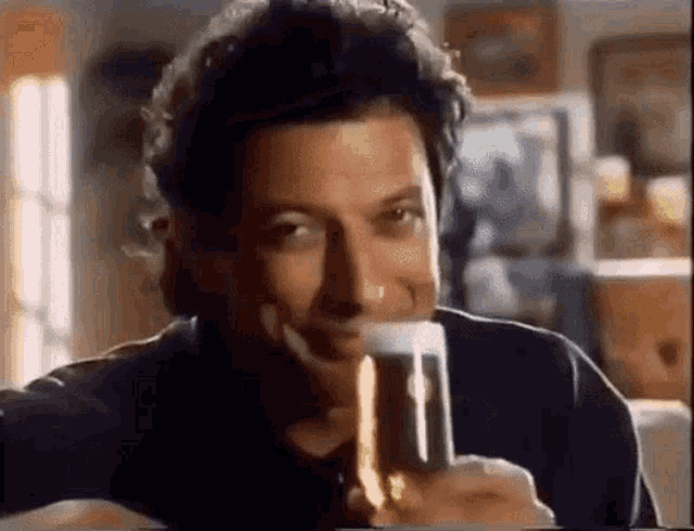 Jeff Goldblum Holsten Pils GIF - Jeff Goldblum Holsten Pils Cheers GIFs