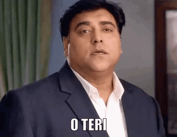 a man in a suit says " o teri " in front of a window