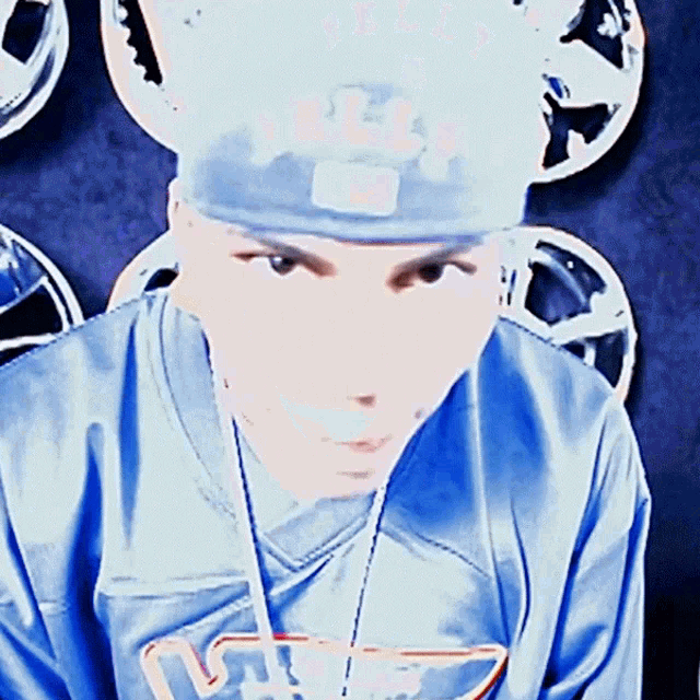 a man wearing a hat that says ' ns ' on it