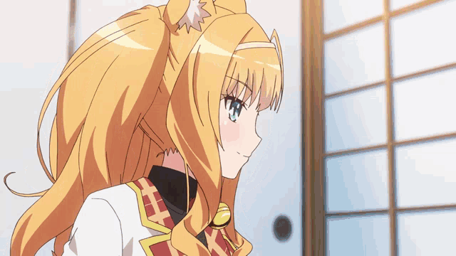 a girl with a cat ear on her head stands in front of a window