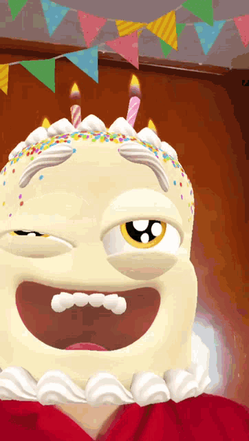 a birthday cake with candles and sprinkles on top