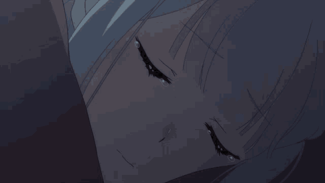 a girl with purple eyes is crying with tears running down her face
