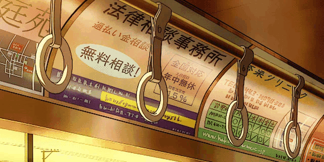 an advertisement for a law firm hangs from a train
