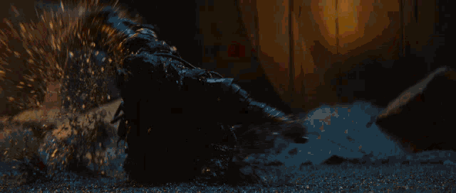 a large explosion is taking place in a dark tunnel .