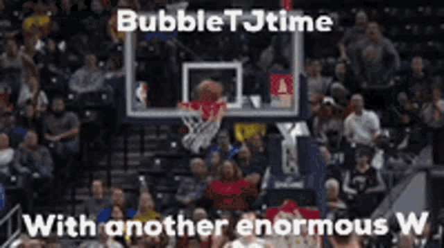 a basketball is going through a net with the words bubbletjtime with another enormous w on the bottom