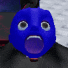 a close up of a blue cartoon character 's face with a surprised expression .